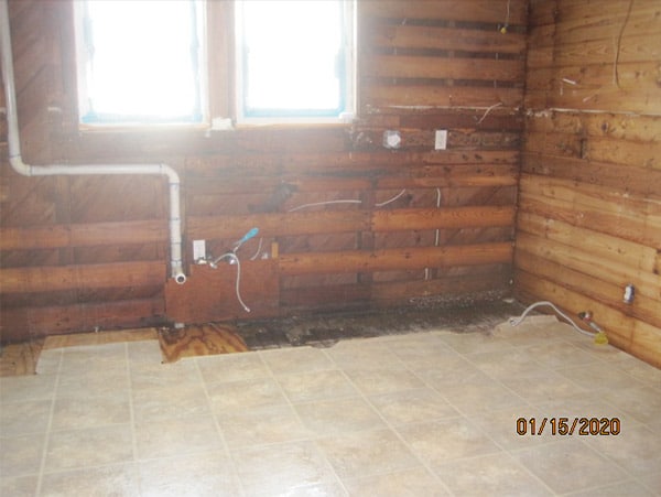 Photo of another interior room of a home in an asbesotos removal project overseen by Precision Environmental Services.